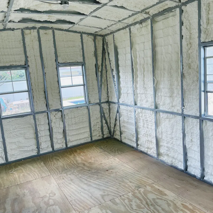 Closed-cell spray foam insulation applied to wall cavities in a residential project in Covington